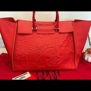 Carolina Herrera handbag red. Leather with print.  Used about 3 times
